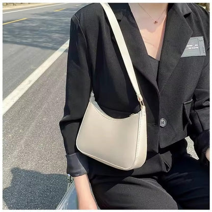 BELÉN - CARTERA DE CUERO CON CORREA AJUSTABLE